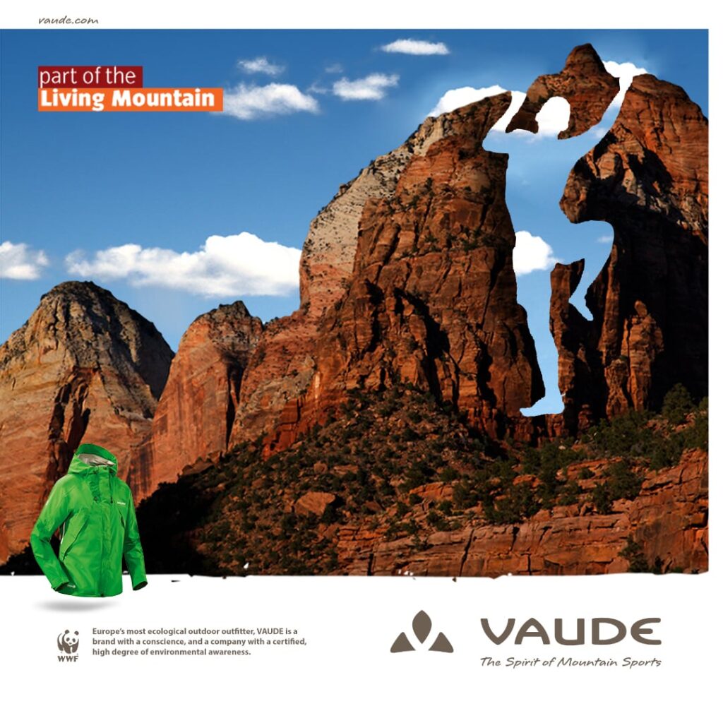 Composition of a climber with a mountain and a wind jacket